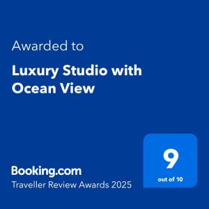 a screenshot of a cell phone with the text awarded to luxury studio with ocean view at Luxury Studio with Ocean View in Batumi