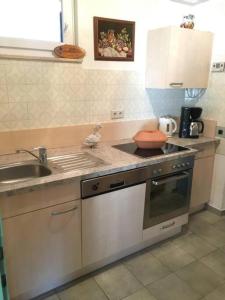 Eldhús eða eldhúskrókur á Appartements Caroline