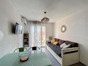 Et tv og/eller underholdning på 3339-Appartement de 4 couchages avec piscine