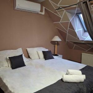 Postel nebo postele na pokoji v ubytování Hotel Unicornis