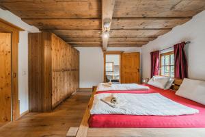 Posteľ alebo postele v izbe v ubytovaní Dachstein Chalet Goisern