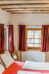 Posteľ alebo postele v izbe v ubytovaní Dachstein Chalet Goisern