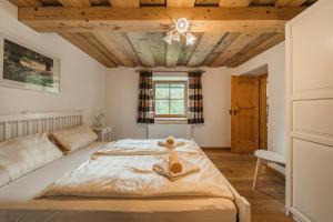 Posteľ alebo postele v izbe v ubytovaní Dachstein Chalet Goisern
