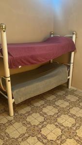 Кровать или кровати в номере Casa Veraneio próximo a lagoa