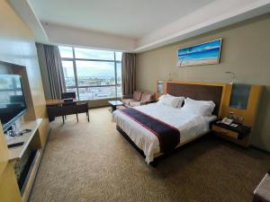TV in/ali zabaviščno središče v nastanitvi Meritz Hotel