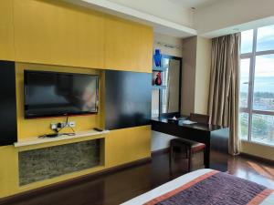 TV in/ali zabaviščno središče v nastanitvi Meritz Hotel