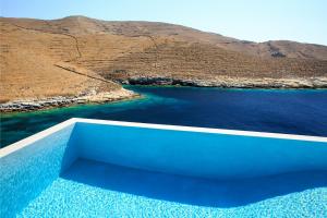 a view of the ocean from the edge of a swimming pool at MV Kythnos in Agios Dimitrios +87 photos
