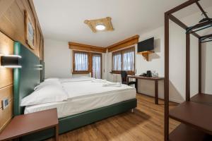 Postel nebo postele na pokoji v ubytování Nord Hotel