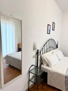 Postel nebo postele na pokoji v ubytování Hotel B&B Nizza Riccione