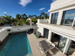 an aerial view of a house with a swimming pool at Casa Spruit in Rojales