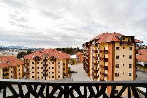 a view of a city from a balcony at Gorski Elegance 1 in Zlatibor