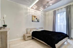 Posteľ alebo postele v izbe v ubytovaní Dom & House – Old Town Waterlane