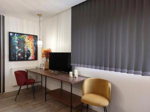 Telewizja i/lub zestaw kina domowego w obiekcie Urbs Amiens Sud