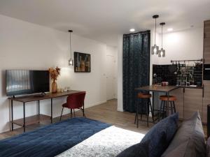 Telewizja i/lub zestaw kina domowego w obiekcie Urbs Amiens Sud