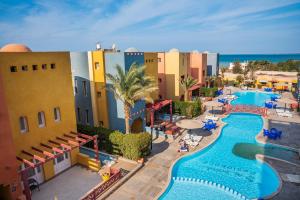 an aerial view of a resort with a swimming pool at Al Dora Residence Suites Hurghada in Hurghada