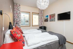 Postelja oz. postelje v sobi nastanitve Hotell Fridhemsgatan