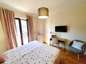 Televiisor ja/või meelelahutuskeskus majutusasutuses Rooms Irena Gregov