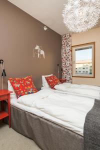 Postelja oz. postelje v sobi nastanitve Hotell Fridhemsgatan