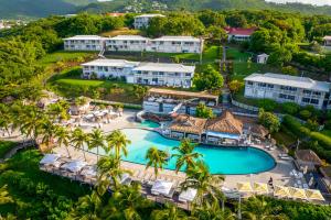 an aerial view of a resort with a swimming pool at Gap Caraïbes in Le Diamant