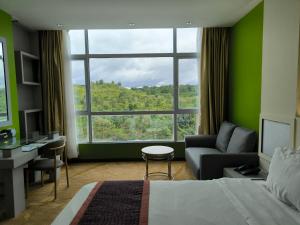 Postelja oz. postelje v sobi nastanitve Meritz Hotel