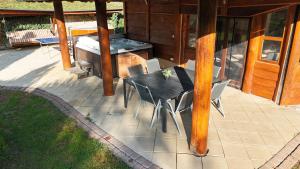 Patio nebo venkovní prostory v ubytování Grande Vendégház