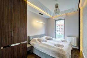 Posteľ alebo postele v izbe v ubytovaní Dom & House – Old Town Waterlane