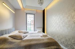 Posteľ alebo postele v izbe v ubytovaní Dom & House – Old Town Waterlane