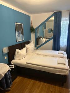 Postel nebo postele na pokoji v ubytování Hotel Pension Haydn