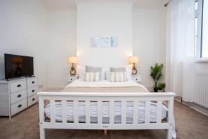 Ένα ή περισσότερα κρεβάτια σε δωμάτιο στο Vacant Nests - The Melrose Beach Free Parking