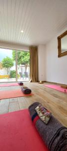 a living room with a rug on the floor at Quinta do Ti Vasco in Pedrógão Grande