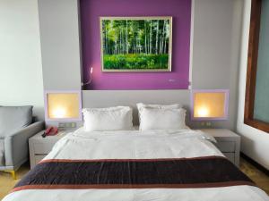 Postelja oz. postelje v sobi nastanitve Meritz Hotel