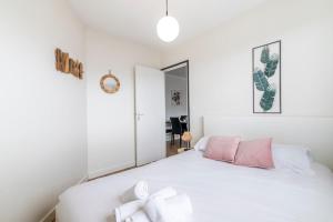 Ένα ή περισσότερα κρεβάτια σε δωμάτιο στο Jungle Indus - Centre & gare à pied