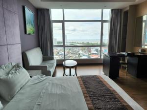 Postelja oz. postelje v sobi nastanitve Meritz Hotel