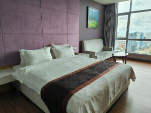 Postelja oz. postelje v sobi nastanitve Meritz Hotel