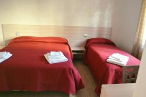 Postel nebo postele na pokoji v ubytování B&B Benvenuti al Sud