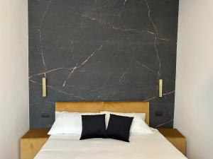 Postel nebo postele na pokoji v ubytování Maison Laurent