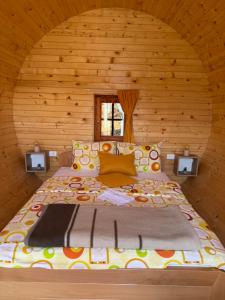 Postel nebo postele na pokoji v ubytování Vila Dobar Pogled
