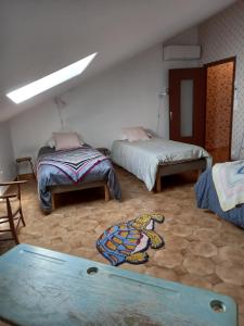 Posteľ alebo postele v izbe v ubytovaní Maison Necty Auvillar