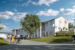 a group of people riding bikes in front of a building at Brentwood U7 I Cozy & Comfy I 2bd I Free Parking in Nashville