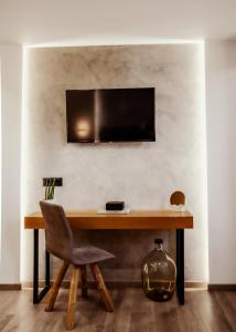 TV a/nebo společenská místnost v ubytování Morfeas Hotel