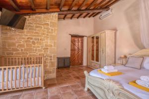 Postel nebo postele na pokoji v ubytování Villa Dimmare by PosarelliVillas + 30 fotografií