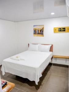 Postel nebo postele na pokoji v ubytování El Cairo Hotel