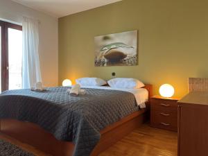 Posteľ alebo postele v izbe v ubytovaní Apartment BEPPO