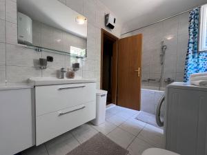 Kúpeľňa v ubytovaní Apartment BEPPO
