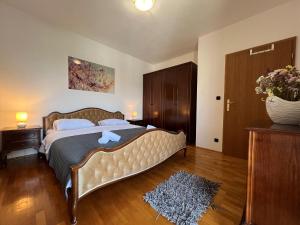 Posteľ alebo postele v izbe v ubytovaní Apartment BEPPO
