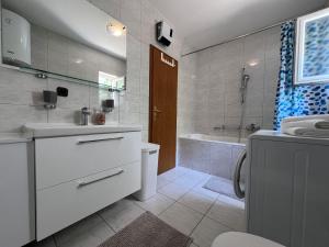 Kúpeľňa v ubytovaní Apartment BEPPO