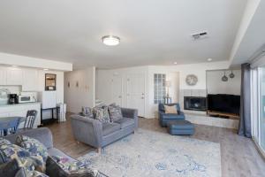 a living room with two couches and a kitchen at 1730 Laguna Drive in Oceano