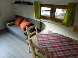 A seating area at Apartment Obertraun