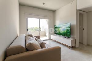 TV a/nebo společenská místnost v ubytování Modern 2 Bedroom Apt In Mburicao Neighborhood