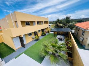 an aerial view of a house with a yard at The Gold Vacation Apartments in Santa Cruz